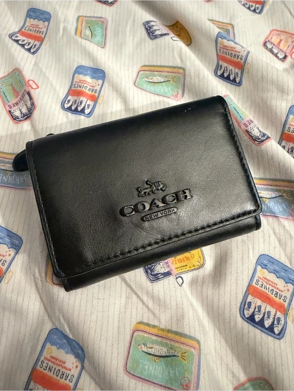 Coach Black Leather Trifold Wallet with Embossed Logo